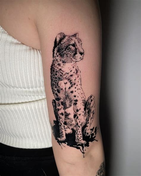 cheetah tattoo female.